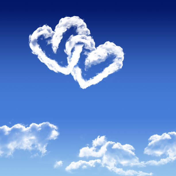 istock heart shaped cloud in the blue sky 907992198