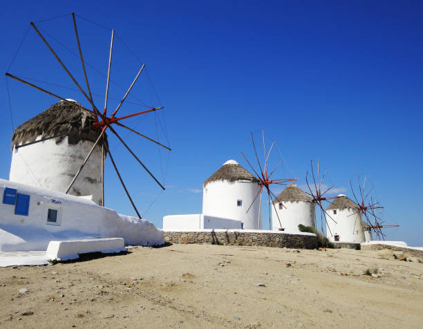 istock Windmills at Mykonos island, Greece 907999386