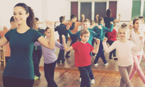 istock Smiling children studying contemp dance 907999860