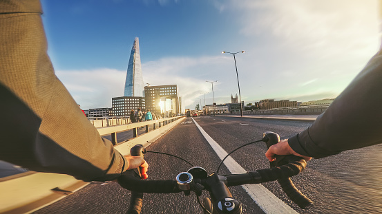POV bicycle riding: commuter with road racing bike in London