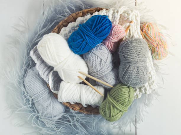 istock many different kinds of colorful wool on white floor 908003872