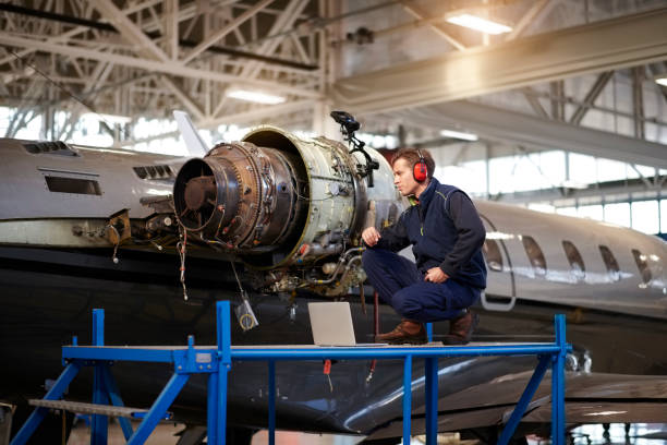 istock Aircraft mechanic in the hangar 908008246