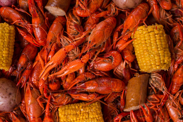 istock Boiled Crawfish with Corn, Sausage, and Potatoes 908010286
