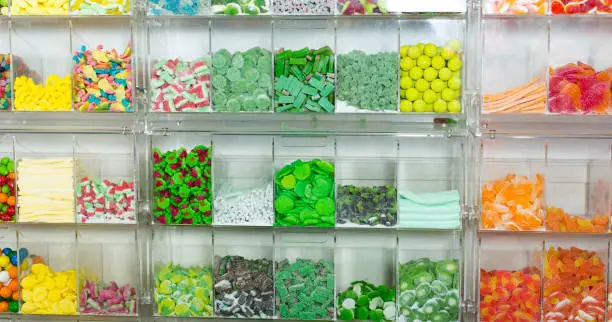 Photo of Shop of tasty sweets multicolored jellybeans