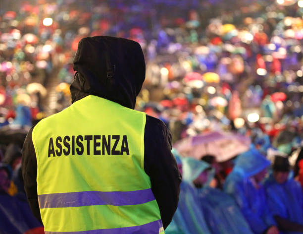 istock italian security guard during the event with text ASSISTENZA that means Assitance in Italian language 908011770