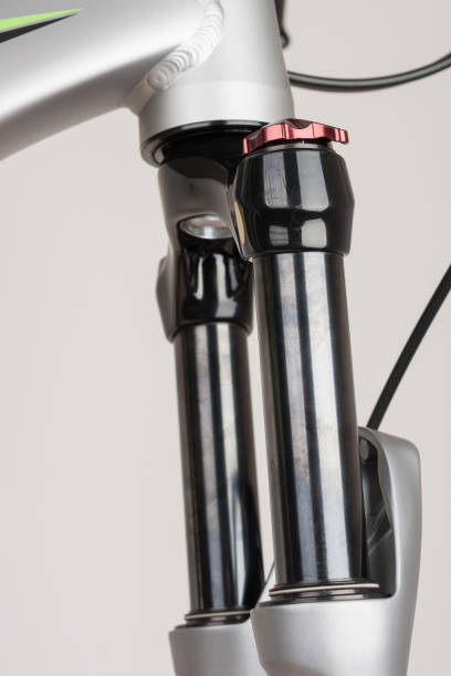 istock Suspension bicycle fork, close up view, studio photo 908012732