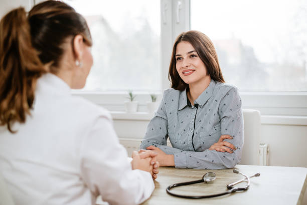 istock Young woman at doctor's office. 908013664