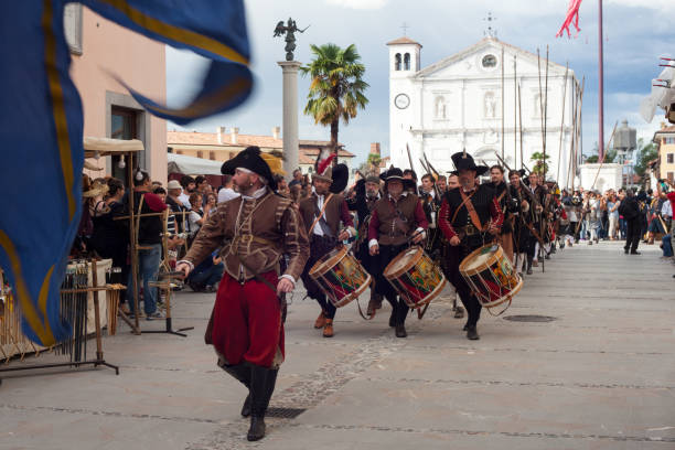 PALMANOVA, ITALY - SEPTEMBER, 03: Parade of historical groups dressed in ancient clothes during the historical Reenactment a.d. 1615 on September 03, 2017