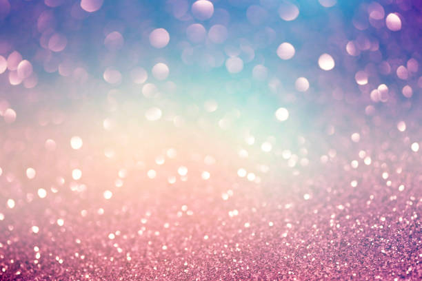 Colorful festive glitter background Blue pink and purple Lights Festive background. Abstract holiday twinkled bright background with natural bokeh defocused white lights. Party abstract background. diamond shaped photos stock pictures, royalty-free photos & images