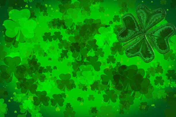 istock Irish themed background with small shamrocks 908021050