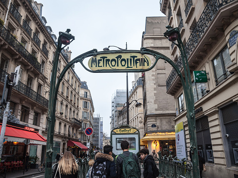 Paris Métro Entrance hold in Art Nouveau Style. The Paris Métro was opened in 1900 and has now a system length of 214 km.