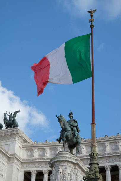 istock Italian flag and Vittoriano monument in Rome 908023114