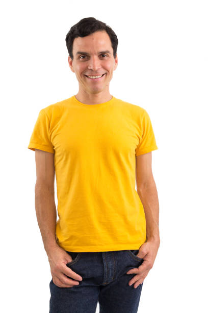 istock Calm man is smiling. He's on his feet. Isolated on white background.