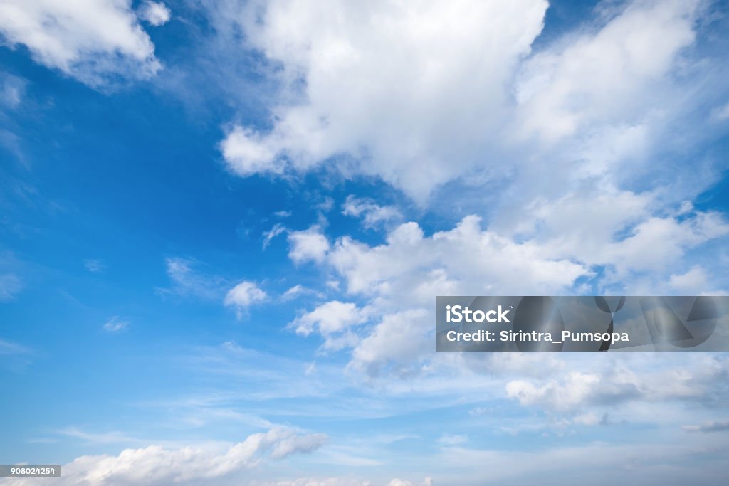 Blue sky with clouds Top view from the airplane window, Natural cloudscape for copy space. Cloud - Sky Stock Photo
