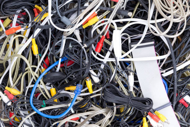 istock Close-up of different tangled cables and wires 908024626