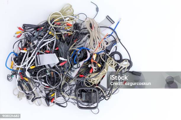 Jumbled Pile Of Electrical Cords And Connectors Stock Photo - Download Image Now - Cable, E-Waste, Chaos