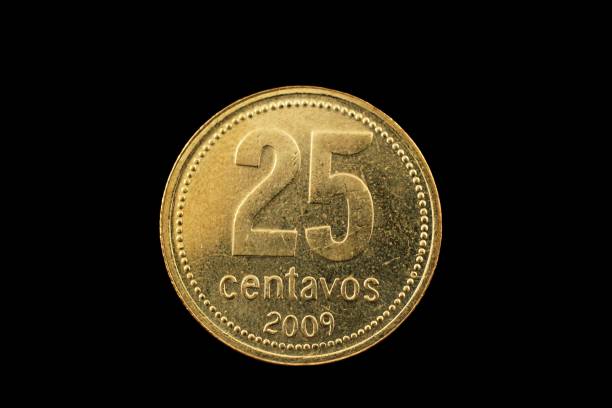 istock Argentine Gold Twenty Five Centavo Coin Isolated On Black 908025498