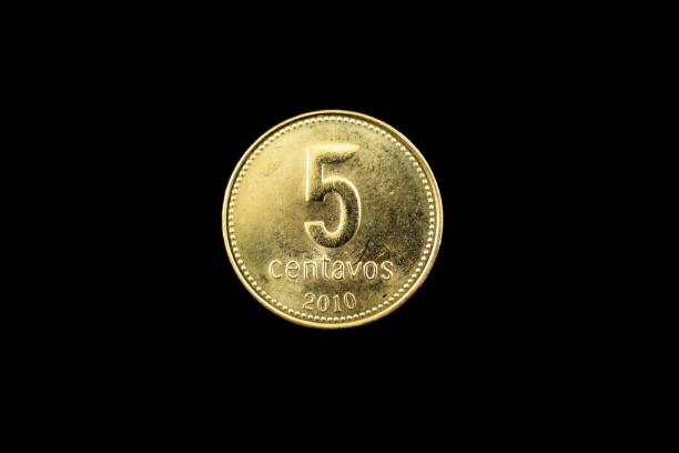istock Argentine Gold Five Centavo Coin Isolated On Black 908025530