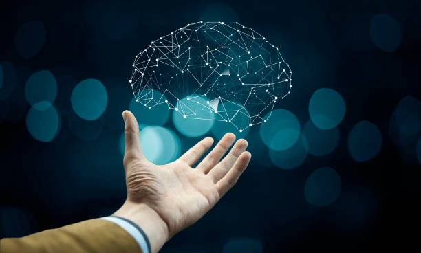 istock businessman hand holding brain in palm 908028274