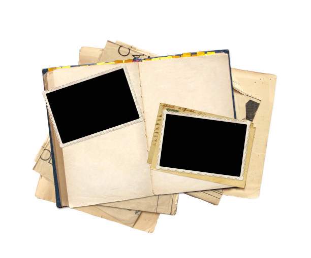 istock Old book and photos 908030790