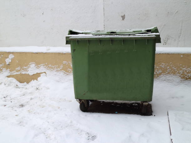 istock garbage can in the street in winter 908031684