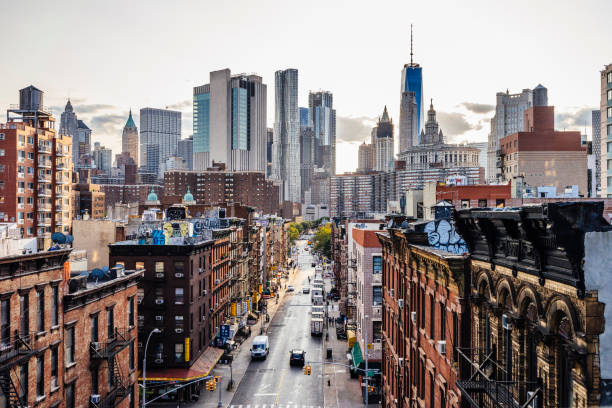 Lower Manhattan cityscape - Chinatown Lower Manhattan cityscape. Chinatown in foreground and Wall street in the background. financial district photos stock pictures, royalty-free photos & images