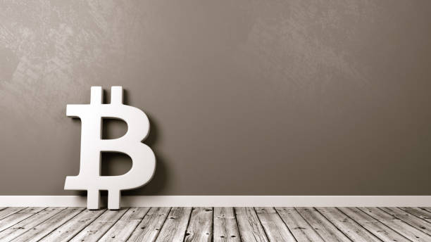 istock Bitcoin Sign on Wooden Floor Against Wall 908036092