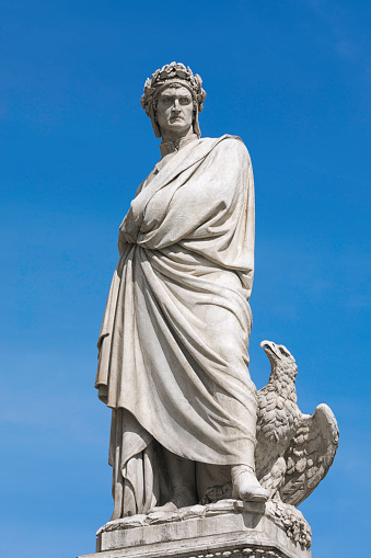 Statue of Dante Alighieri in Piazza Santa Croce in Florence. The sculpture was made by Enrico Pazzi (1818-1899) in 1865.