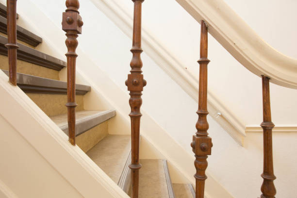 istock Wood stairs white and old design 908036832
