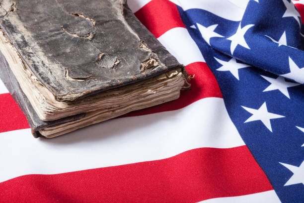 istock Antique Book On American Flag 908040510