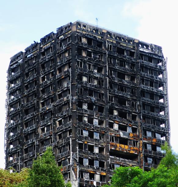Grenfell Tower tragedy, London The burnt out remains of the 24-storey Grenfell Tower block in West London, which burnt down in the early hours of June 14th 2017 claiming the lives of around 100 people and making many more homeless. The fire, which was believed to have been caused by a faulty plug on a refrigerator, rapidly spread throughout the building due to the highly combustible nature of the exterior cladding of the tower block. The event was one of the worst losses of life caused by a domestic fire in the UK in living memory and was a national tragedy. kensington and chelsea photos stock pictures, royalty-free photos & images