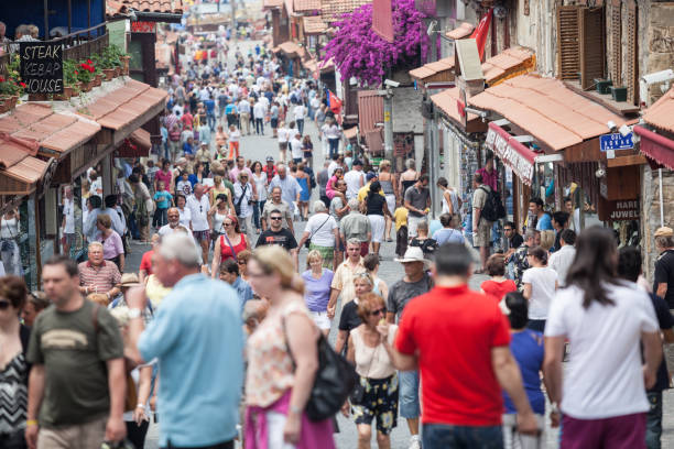 Tourists walking on main street in town of Side Antalya stock photo
