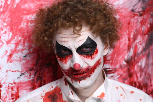 istock halloween make up man crazy clown 908043060