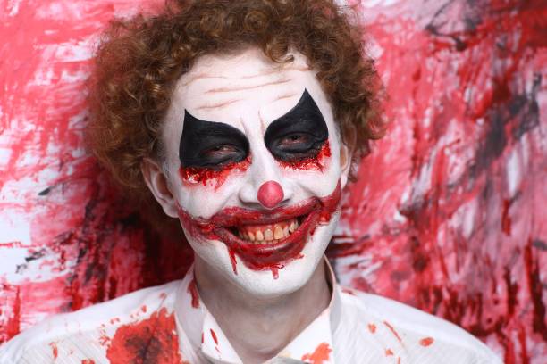 istock halloween make up man crazy clown 908043096
