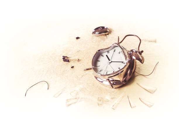 istock photo of a destroyed alarm clock 908045248