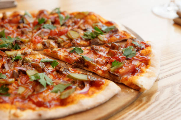 istock Meat pizza with hot bbq sauce 908046544