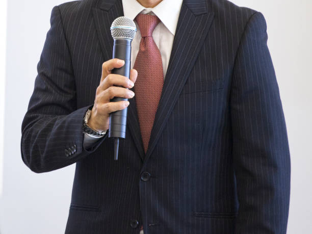 istock businessmen on a conference close up 908054728