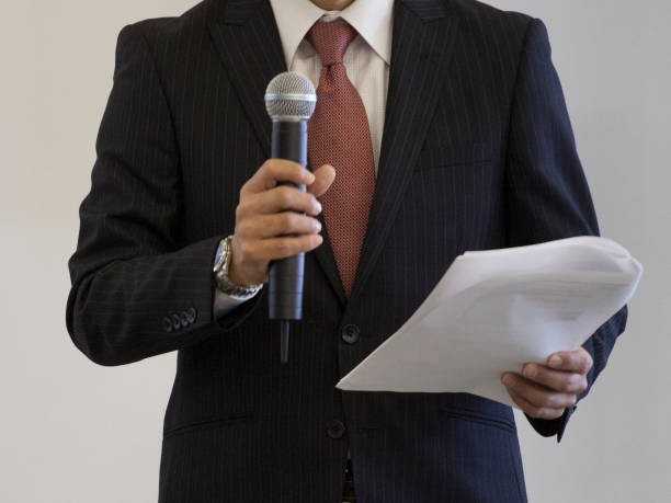 istock businessmen on a conference close up 908054766