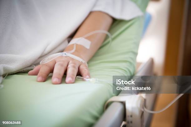 Focus Patients Hand Has Get The Saline Solution Syringe On It Illness And Treatment Health Insurance Plan Stock Photo - Download Image Now