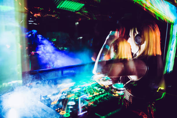 istock Young Female DJ Performing in Nightclub 908063522