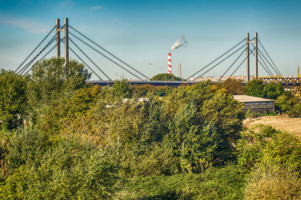 istock Railway bridge in Belgrade and big chimney 908065774