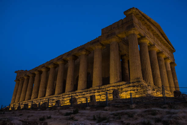 istock Greek Temple during sunset in Agrigento, Sicily 908069656