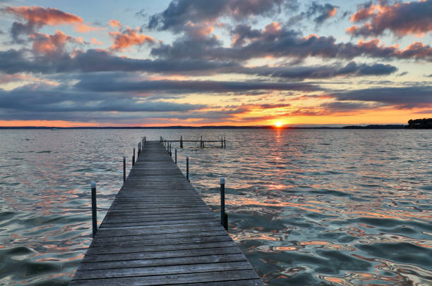 istock Beautiful summer sunset over the lake. 908070292
