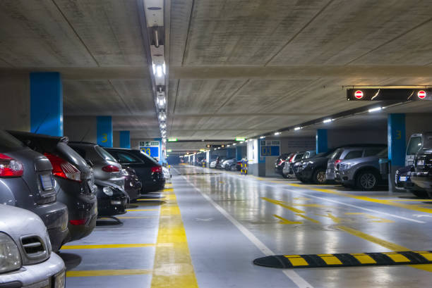 Large multi-storey underground car parking garage stock photo