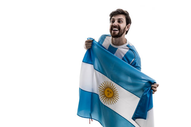 istock Argentinian male athlete / fan celebrating on white background 908080546