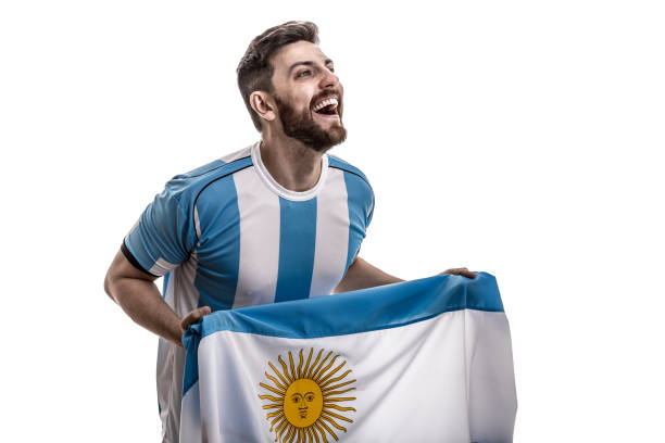 istock Argentinian male athlete / fan celebrating on white background 908080552