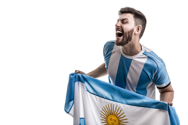 istock Argentinian male athlete / fan celebrating on white background 908080556