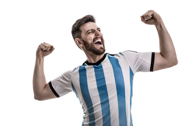 istock Argentinian male athlete / fan celebrating on white background 908080576