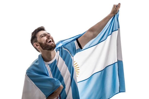 istock Argentinian male athlete / fan celebrating on white background 908080582