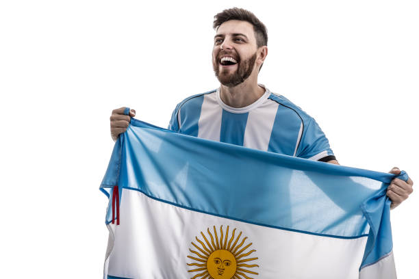 istock Argentinian male athlete / fan celebrating on white background 908080584